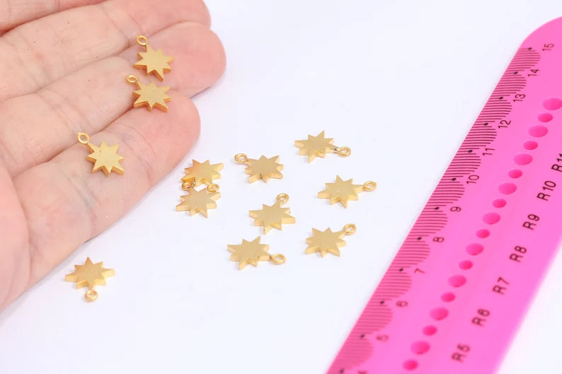 Ciondoli a forma di stella polare in oro opaco 24k da 10x13 mm, Stella polare, oro MTE6