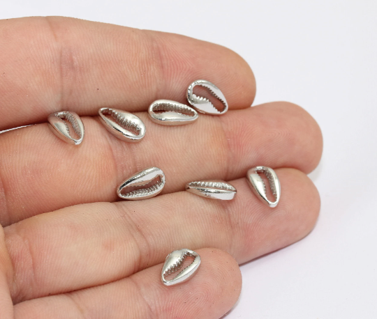 7x11mm Rhodium Plated Cowrie, Cowrie Charms, Cowrie MLS261