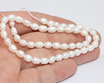 Filo di perle naturali da 5x7 mm, acqua dolce bianca CHK473