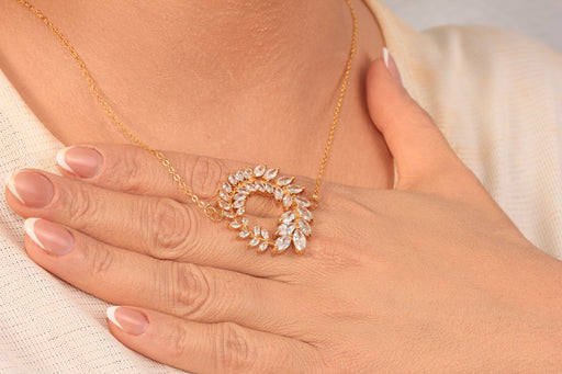 Gold Necklace With Baguette Stone Flower Pendant