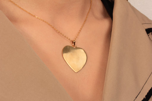 Gold Necklace With Heart Medallion