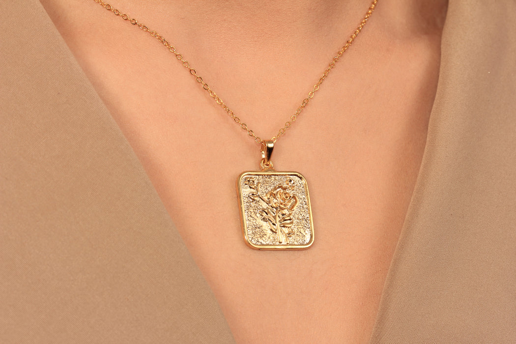 Gold Necklace With Flower Medallion