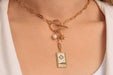 Gold Necklace With Toggle Clasp and Charms