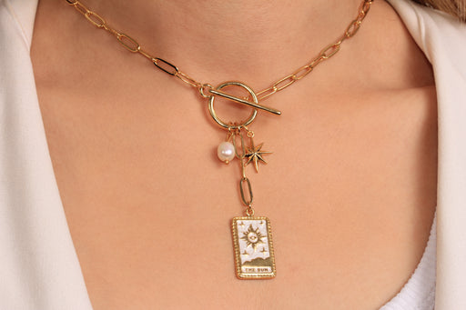 Gold Necklace With Toggle Clasp and Charms