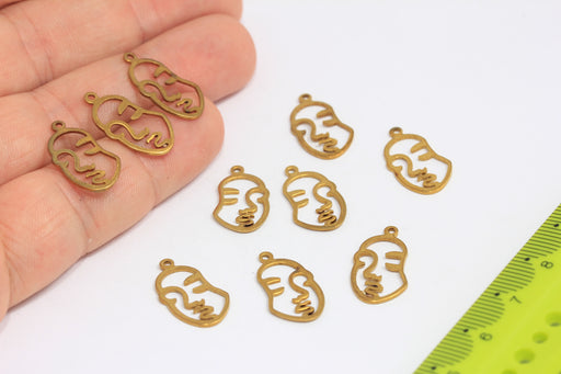 Brass Face Charms