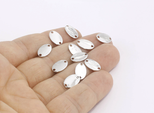 Disco ovale placcato argento a due fori da 7x11 mm, monete, braccialetto AE176